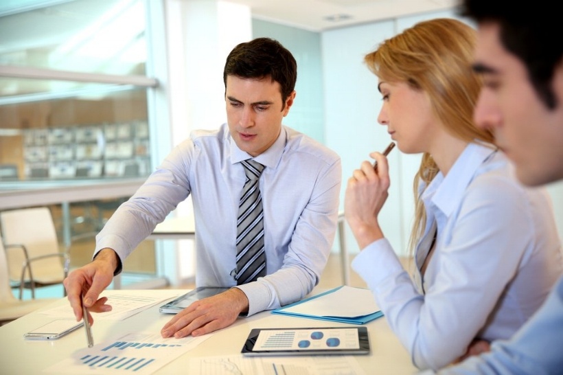 Manager presenting budget to marketing people-797389-edited.jpeg